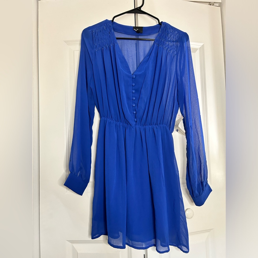 Light and flowy dress, sheer top, lining under skirt.